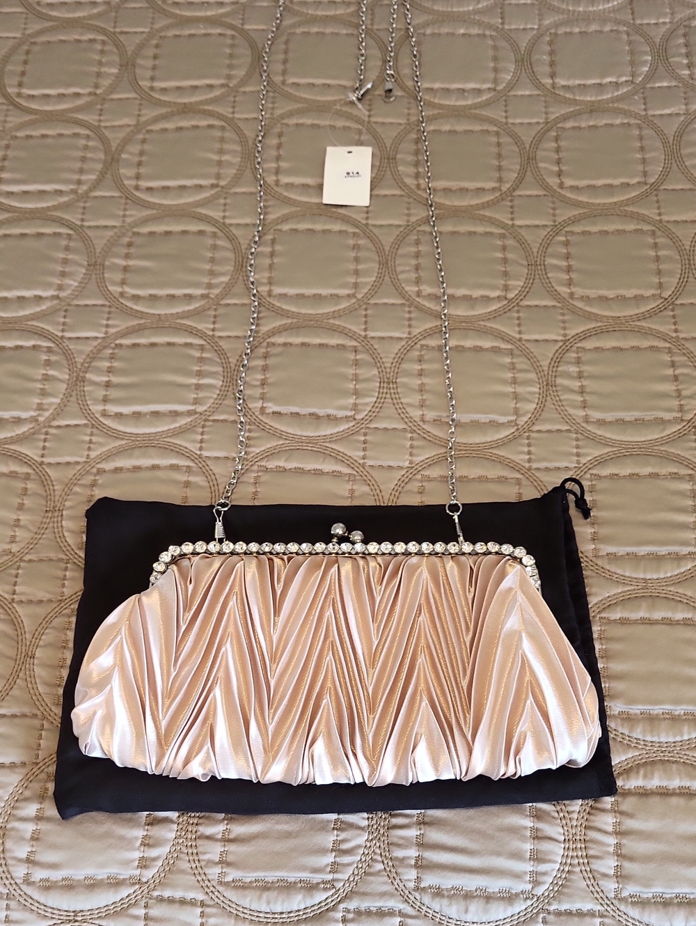 Elegant Champagne Satin Evening Clutch with Rhinestone Frame.